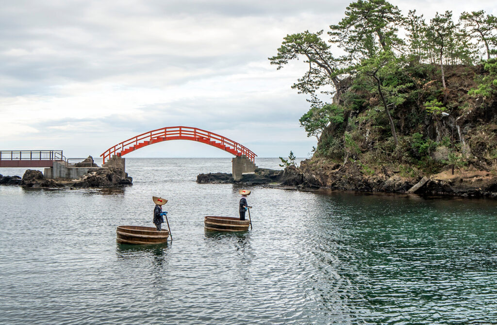 Special tub-boats sailing in a bay at Sado, Japan